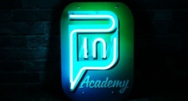 "Pin academy" Custom neon sign on printed background